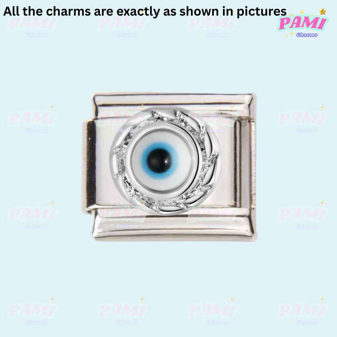 Silver Italian charms with a blue and white evil eye design in the centre