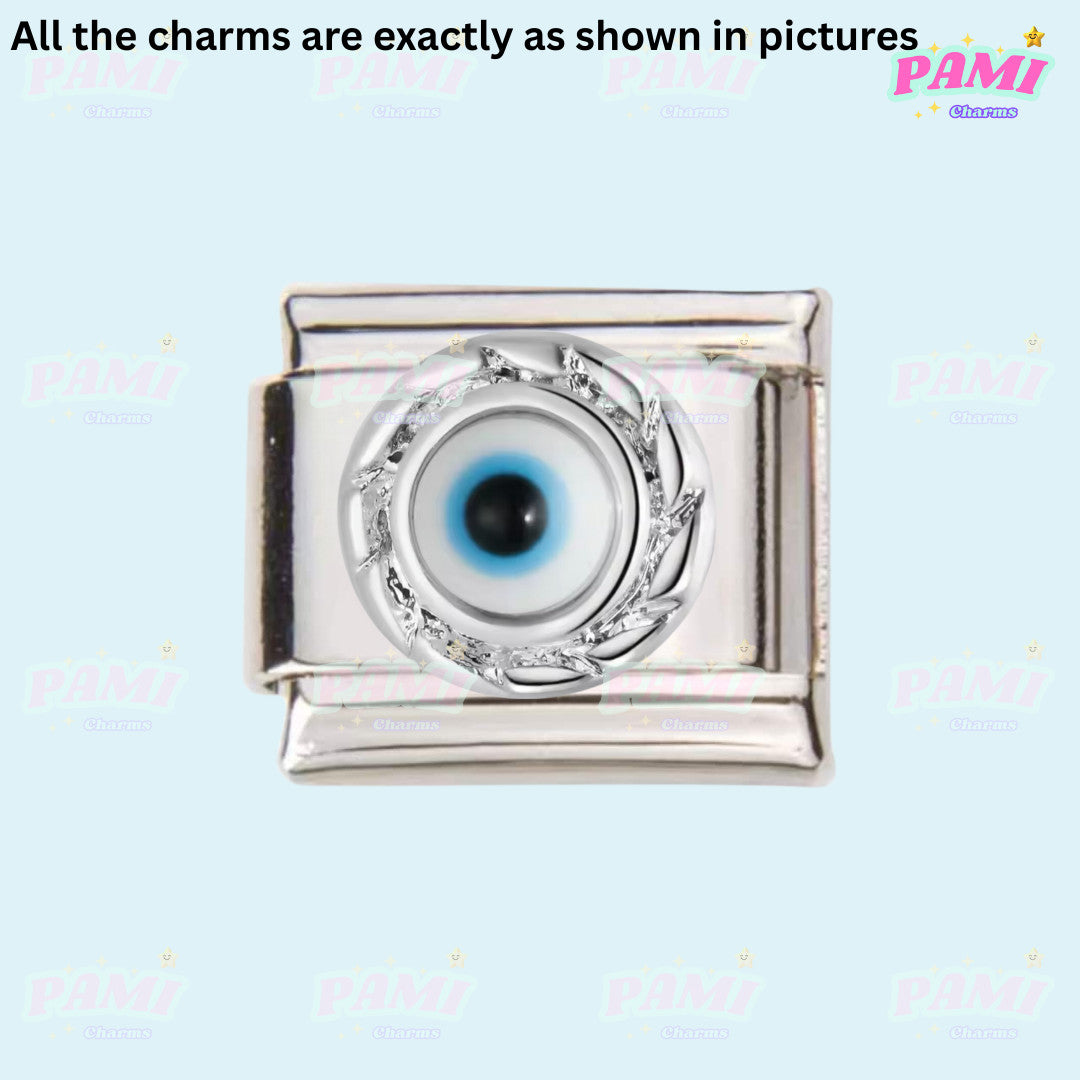 Silver Italian charms featuring a detailed blue eye design with a decorative border
