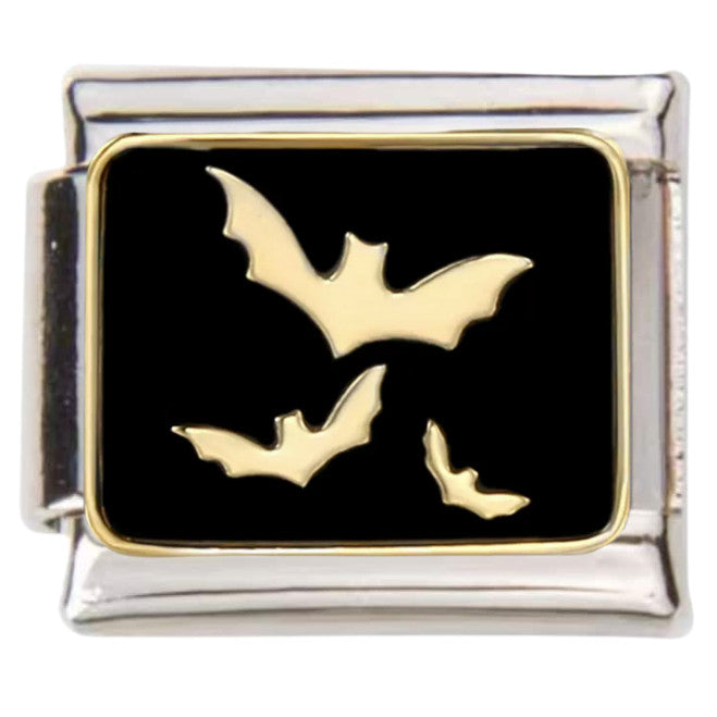 Pami Charms Italian charms featuring three gold bats on a black background in a silver frame