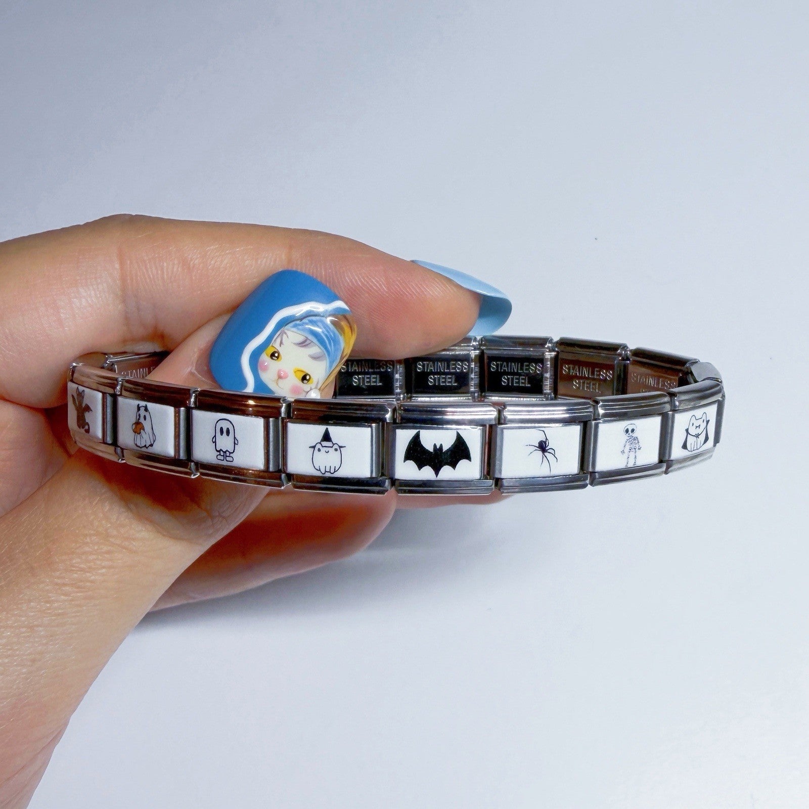 Italian charm bracelet featuring various fun designs with stainless steel links