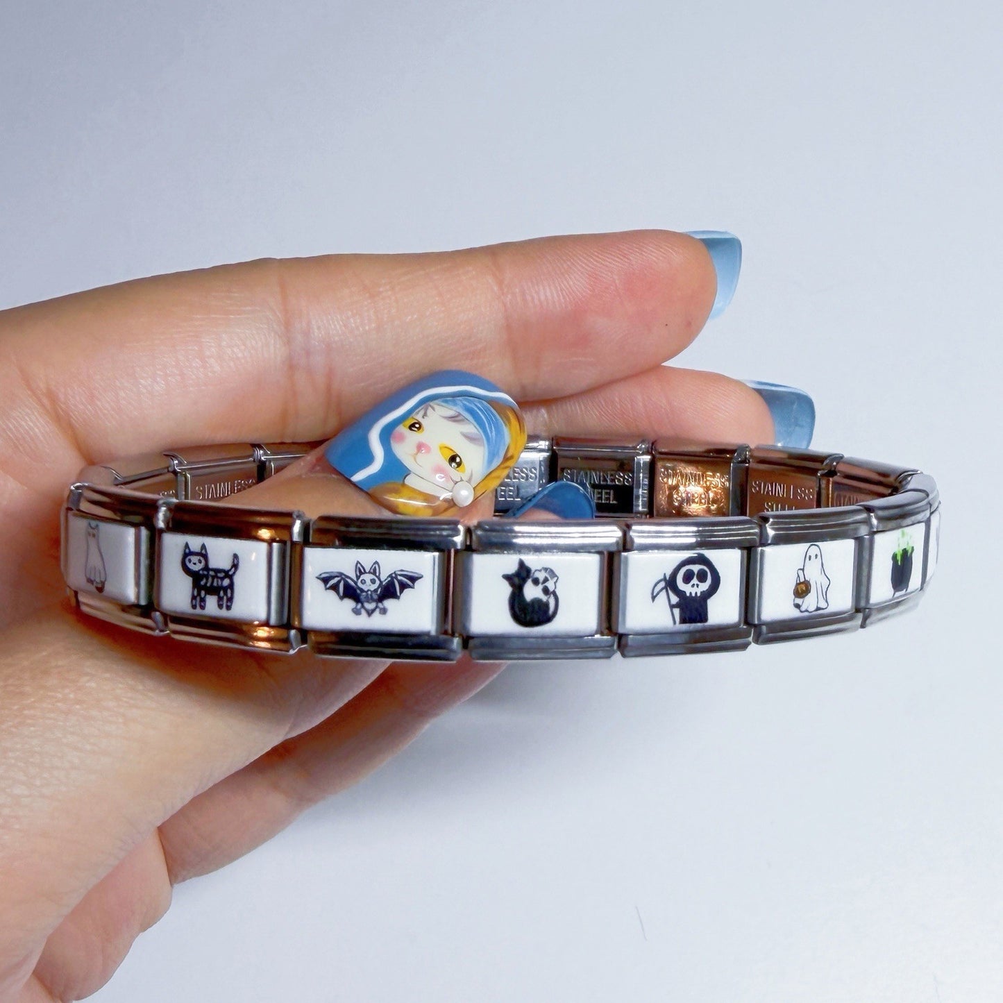 Pami Charms Italian charm bracelet featuring cute designs like cats and bats