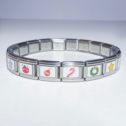 Pami Charms Italian charm bracelet featuring festive holiday designs and a silver finish