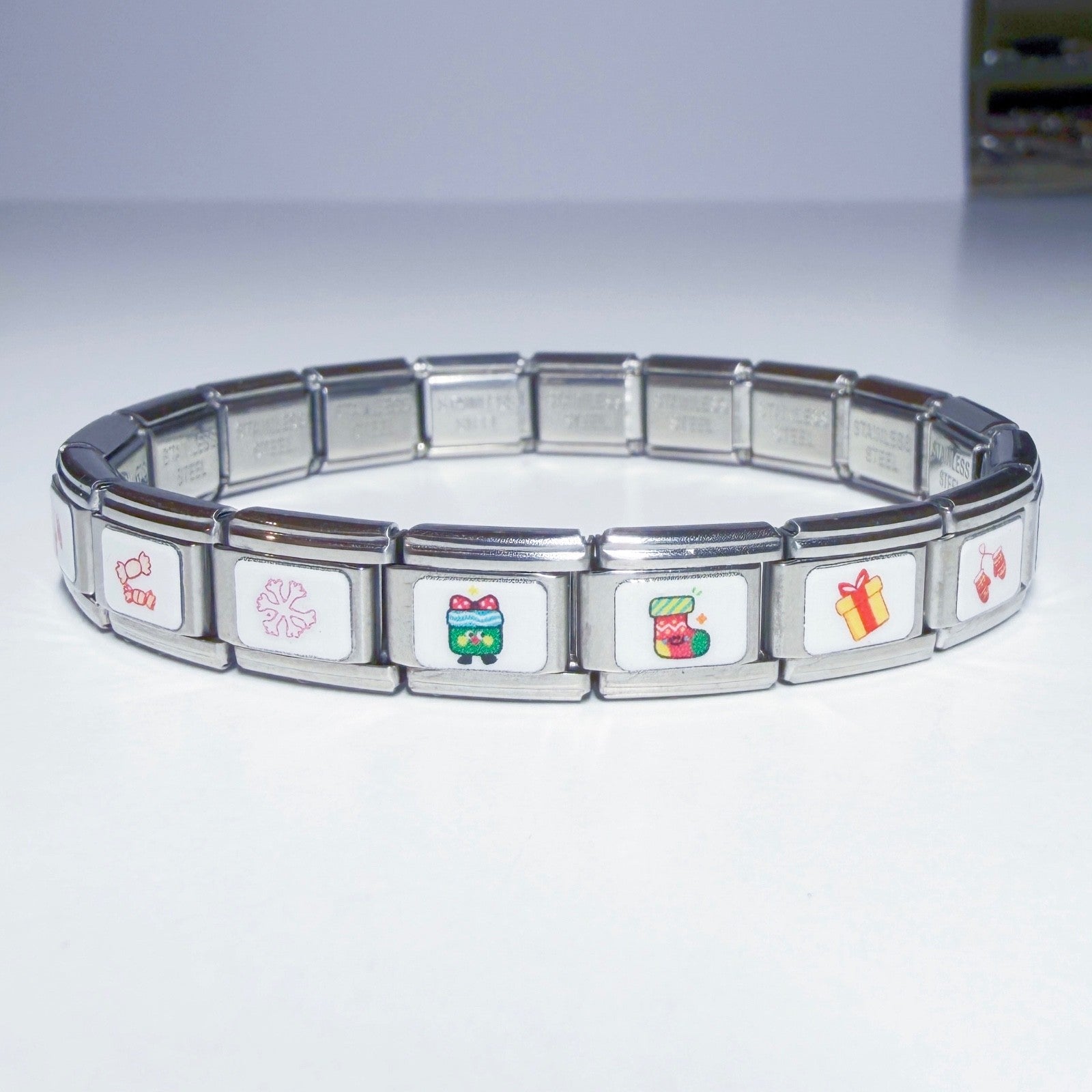 Pami Charms Italian charm bracelet featuring festive holiday designs in vibrant colours