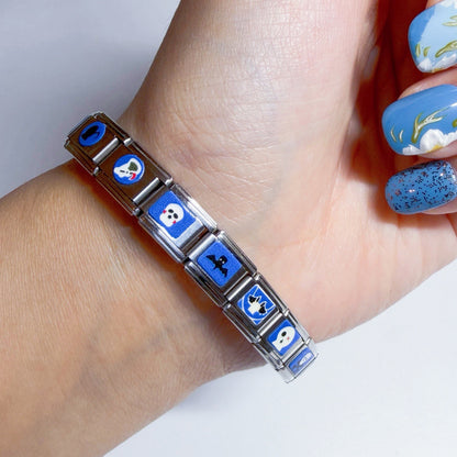 Pami Charms Italian charm bracelet featuring vibrant blue designs and silver links