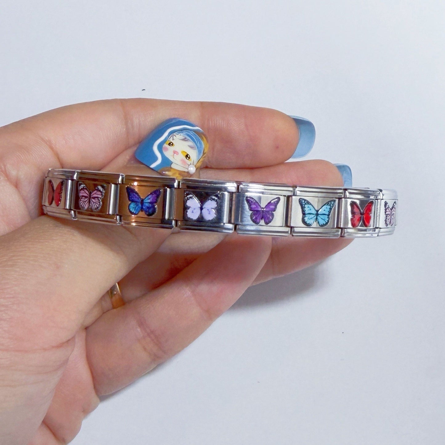 Pami Charms Italian charm bracelet featuring colourful butterfly designs for a stylish accessory