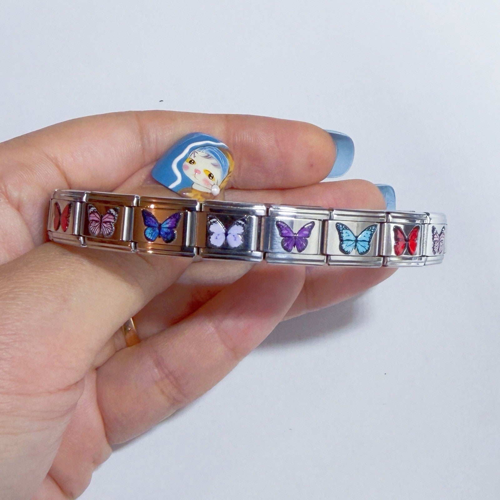 Pami Charms Italian charm bracelet featuring colourful butterfly designs for a stylish accessory