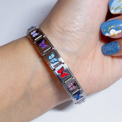 Pami Charms Italian charm bracelet featuring butterfly designs on a silver-tone band