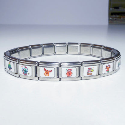 Pami Charms colourful Italian charm bracelet featuring festive designs like Santa, reindeer, and Christmas tree