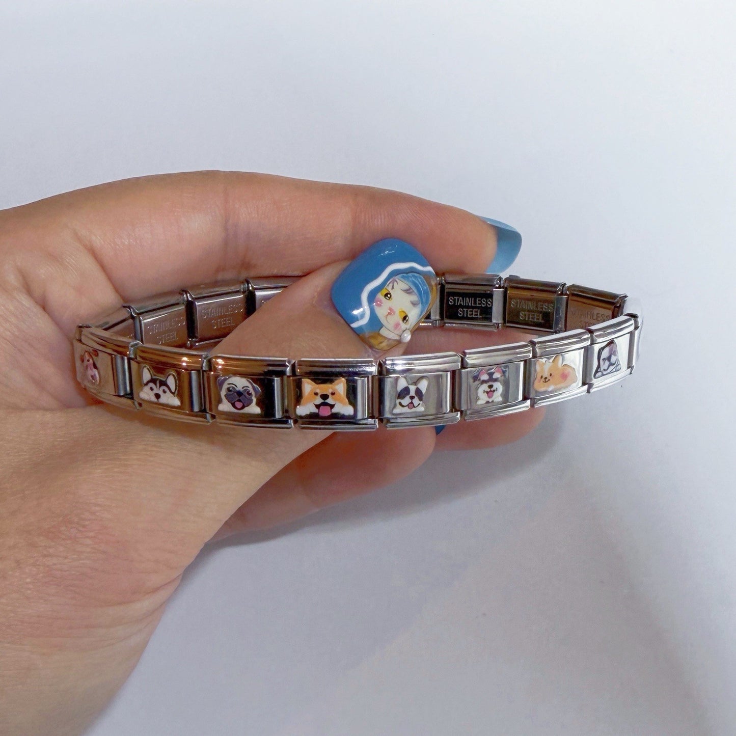 Pami Charms Italian charm bracelet featuring adorable pet designs in stainless steel