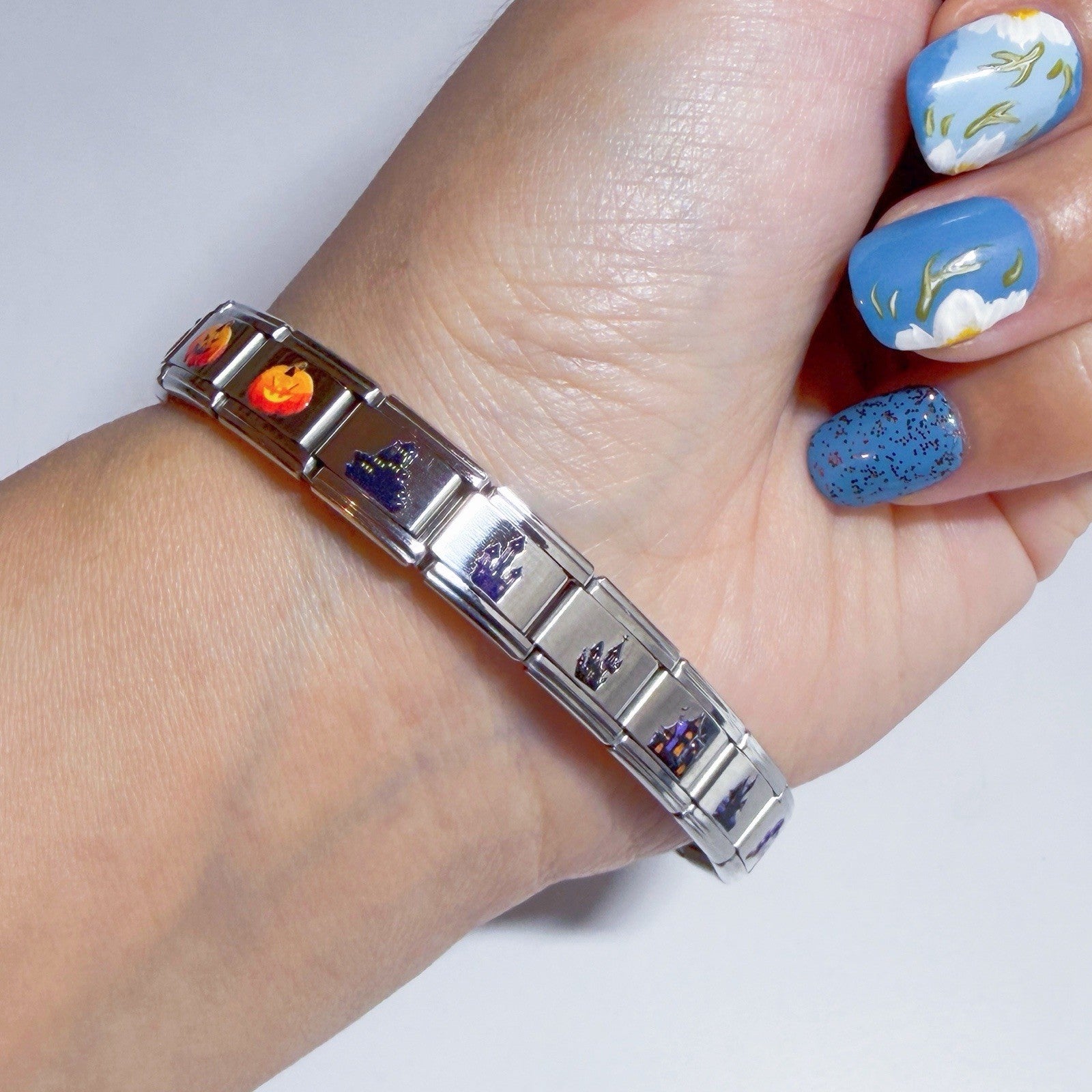 Pami Charms Italian charms bracelet featuring colourful designs on a silver band