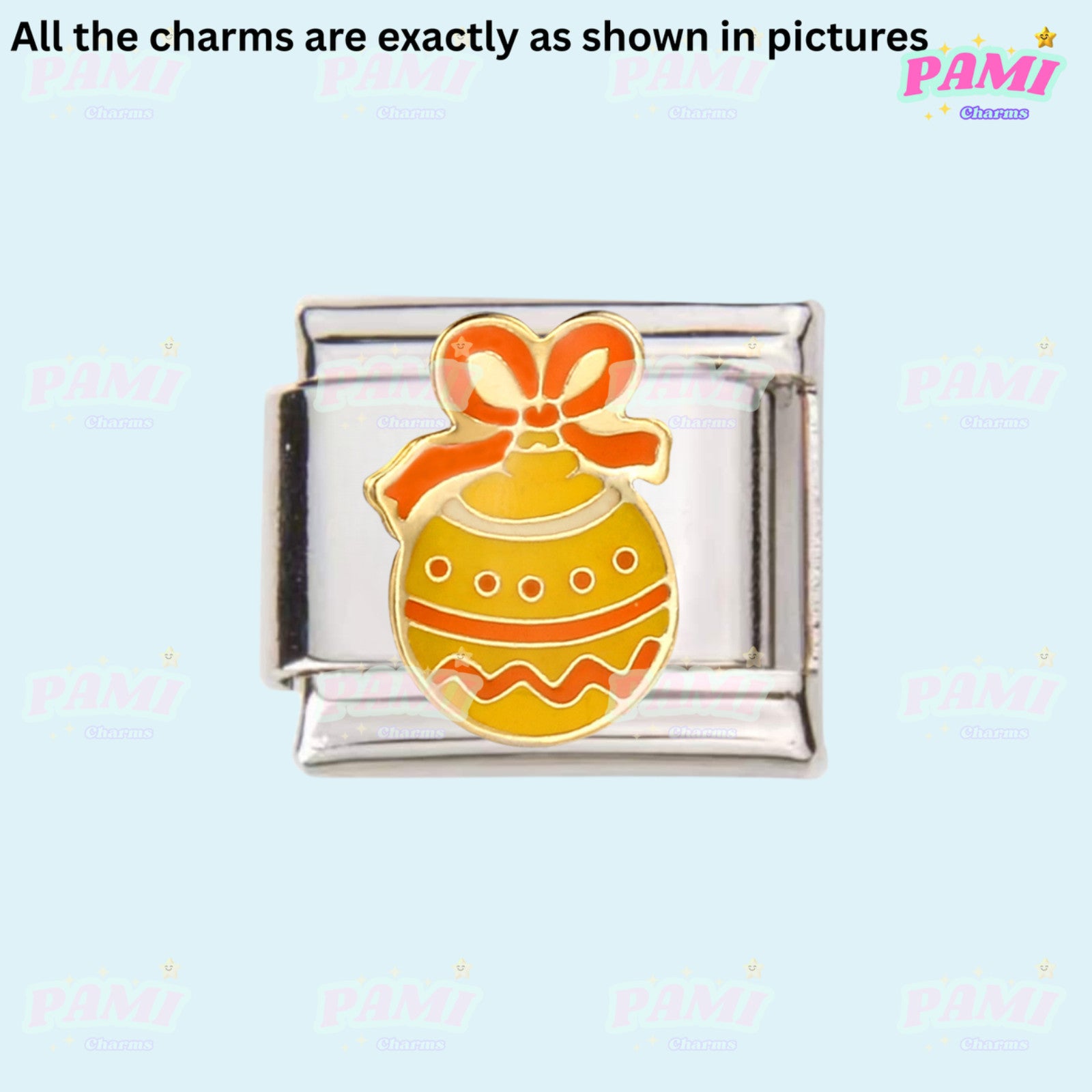 Pami Charms Italian charm featuring a yellow and orange Easter egg design with a red bow