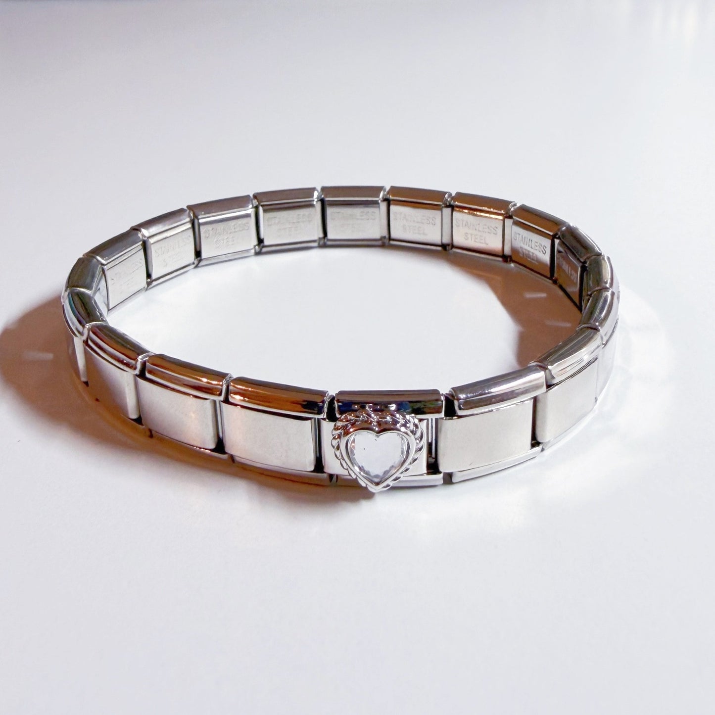 Pami Charms shiny silver bracelet featuring an Italian charm heart design for personalised style