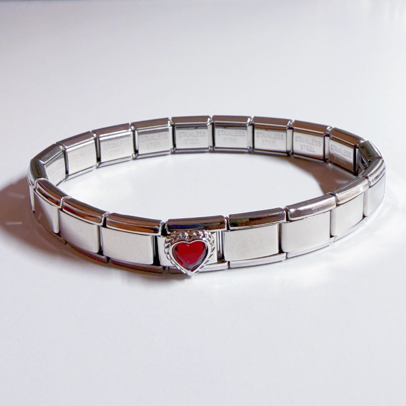 Pami Charms Italian charm bracelet featuring a heart design in the centre with a shiny silver finish