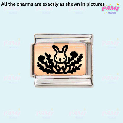 Pami Charms Italian charms featuring a rabbit design with black detailing on a rose gold and silver base