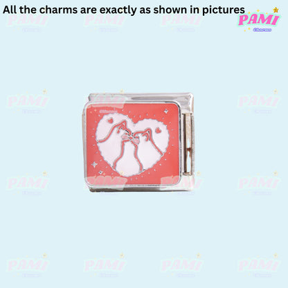 Pami Charms Italian charms featuring two cats touching noses inside a heart on a red background
