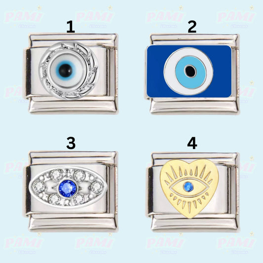 Set of four italian charms featuring blue eye designs and silver and gold finishes by Pami Charms