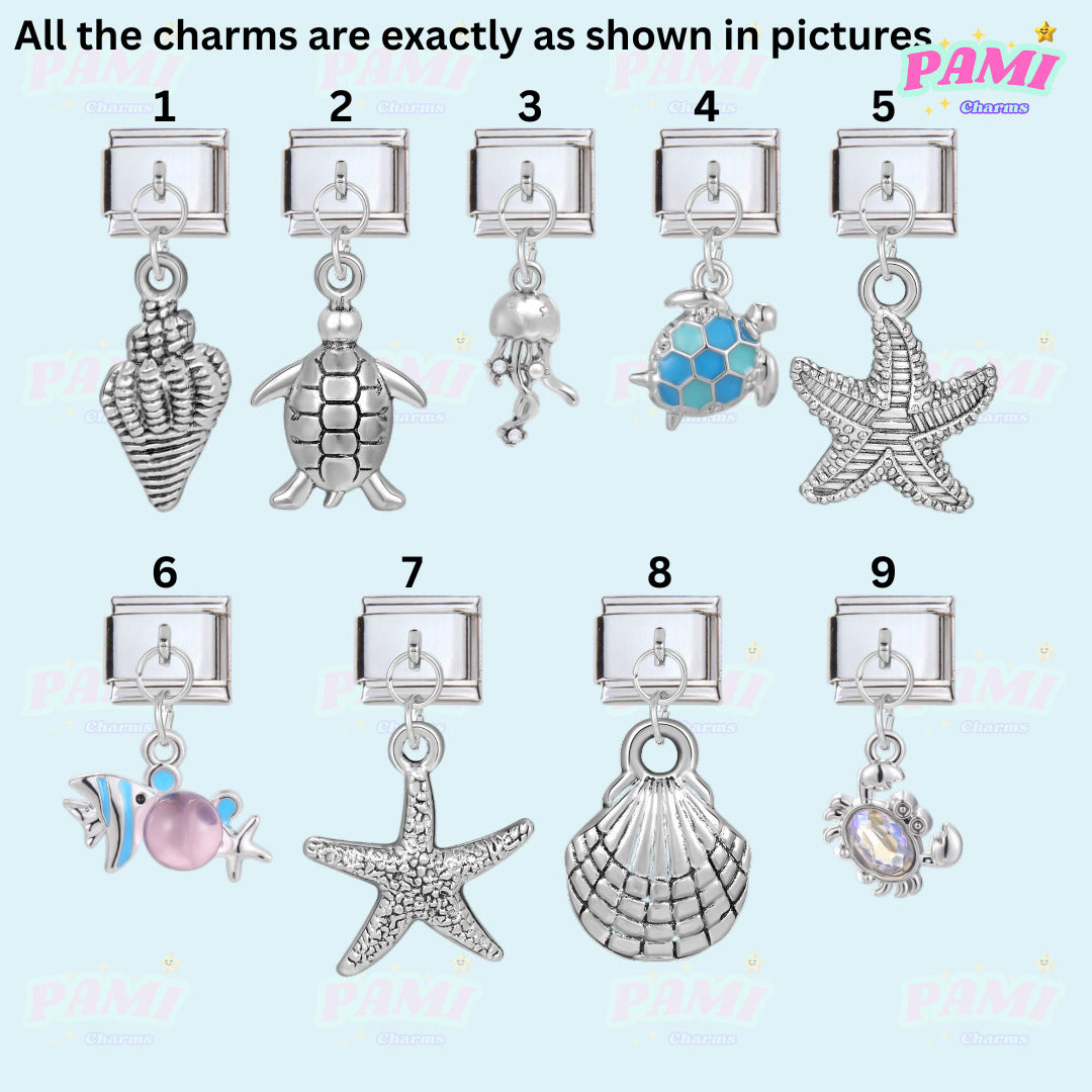 Set of nine Italian charms by Pami Charms featuring sea-themed designs like turtle, starfish, and seashell