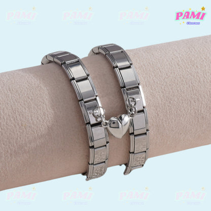 Pami Charms silver Italian charms link bracelets with heart-shaped charm on beige display